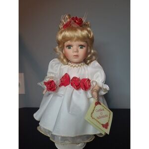 Collectable Soft Expressions Doll white dress red ribbon